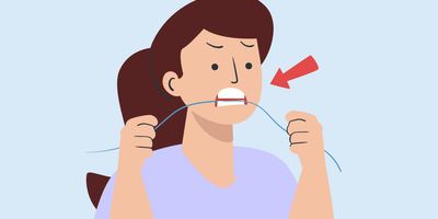 how to floss back teeth