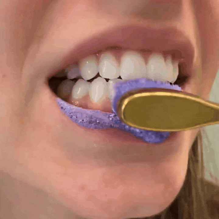 Brushing with the purple powder